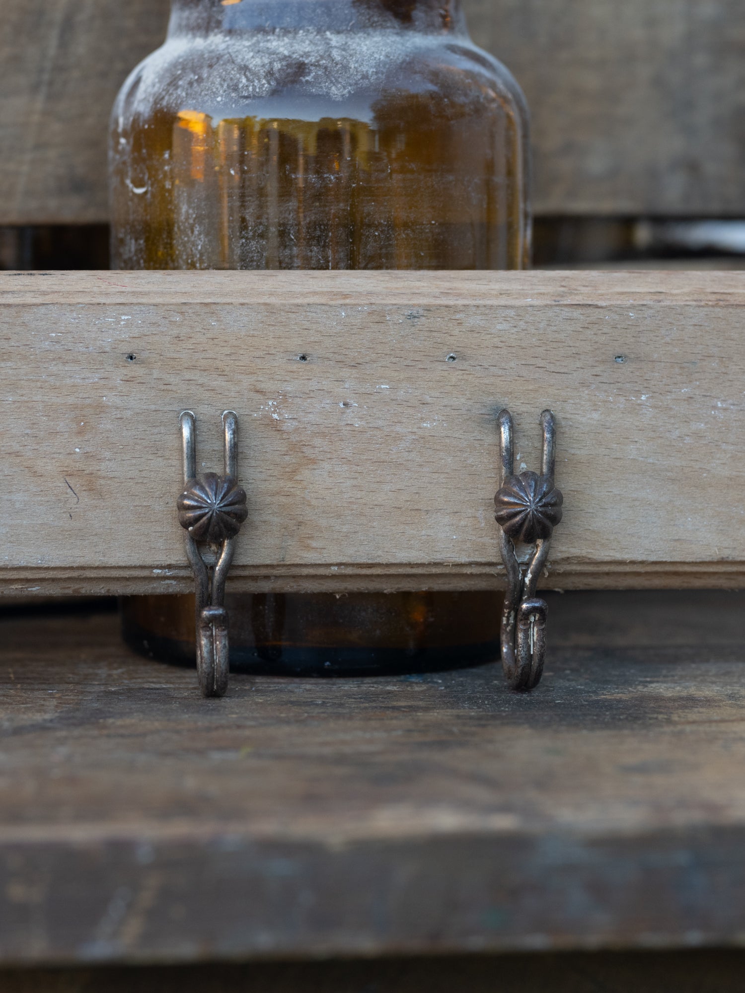 Vintage French Metal Hooks on Wood